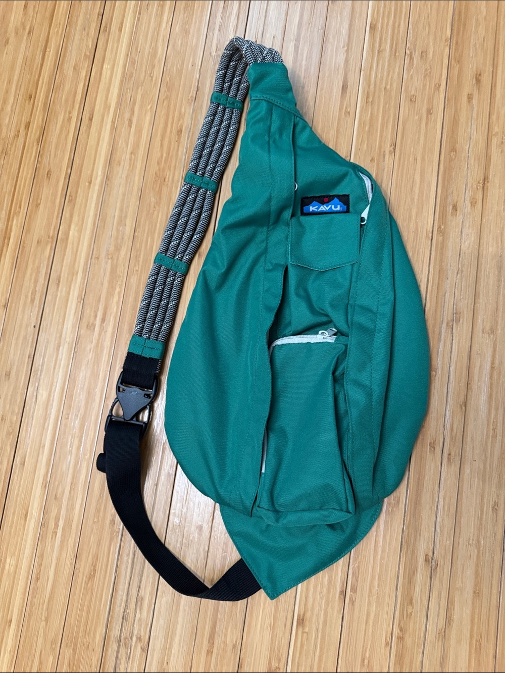 Kavu Teal Green Sling Bag with Rope-Style Strap
